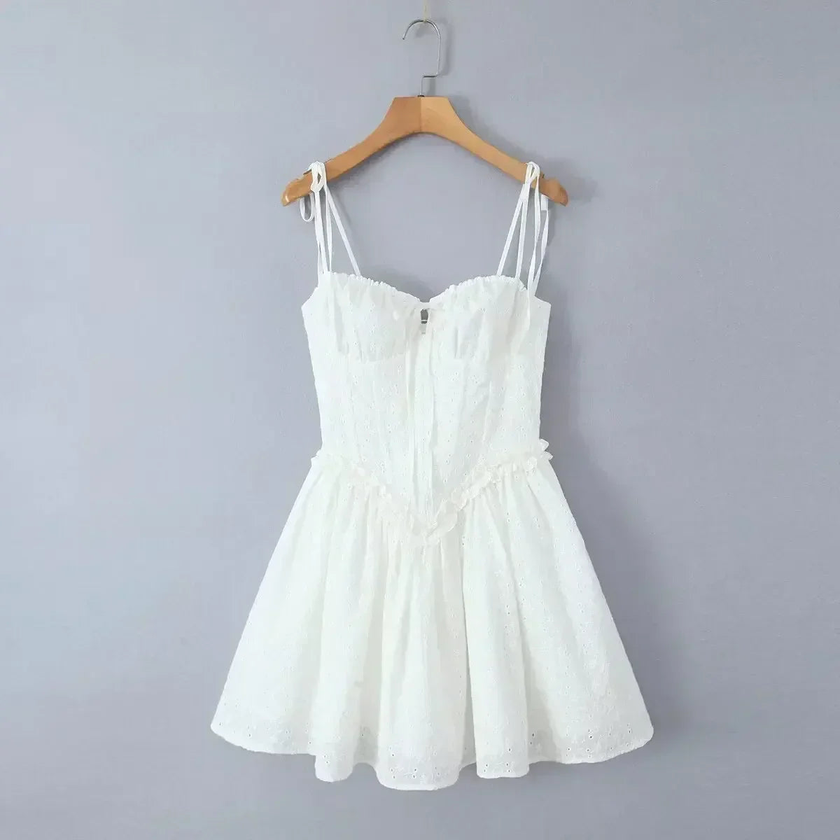YENKYE Sexy Elegant Women Hollow Out Embroidery Yellow Sling Mini Dress Low Waist Lace Up Bandage Party Dresses Birthday Robe